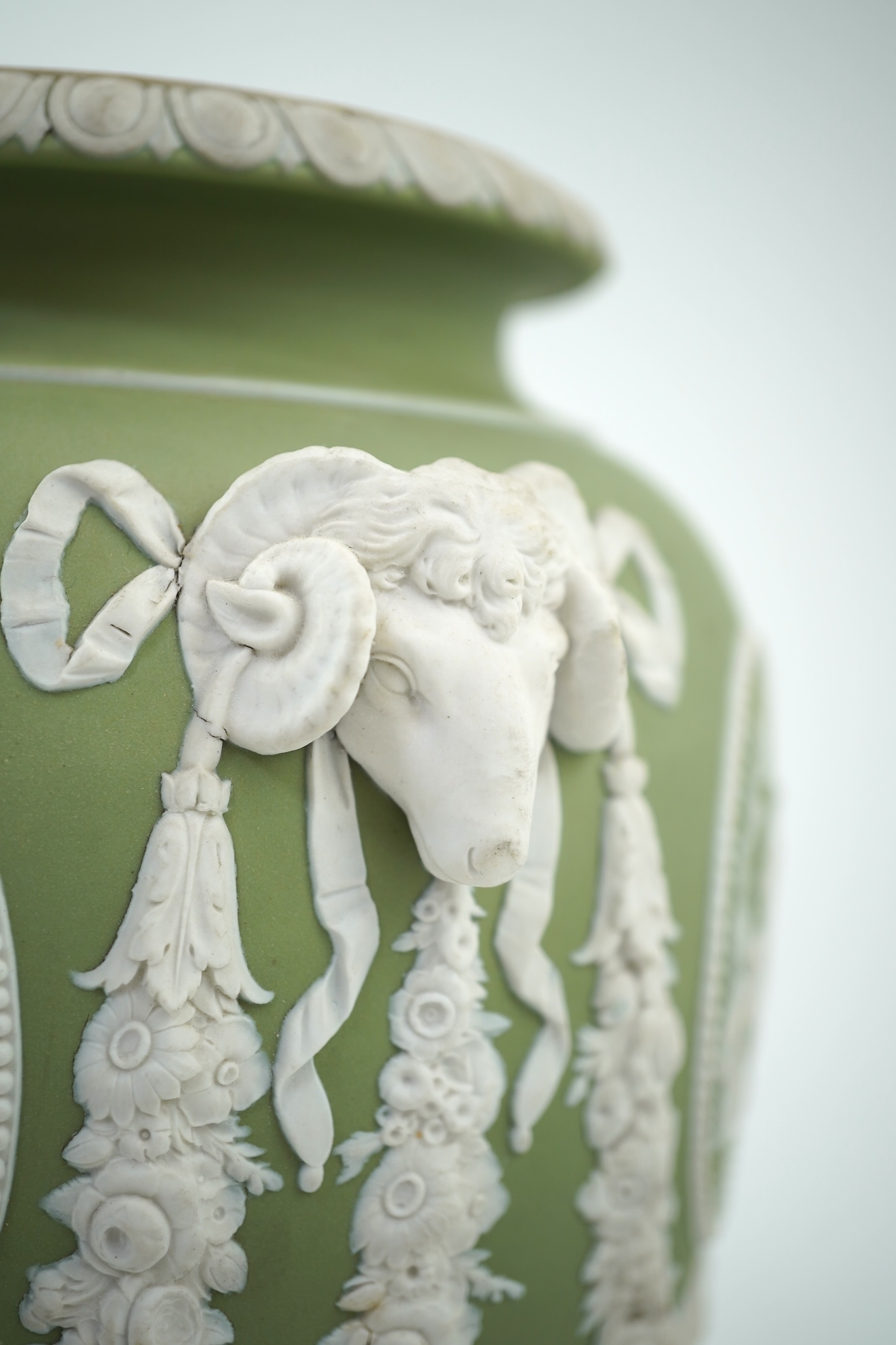 A Wedgwood green jasperware covered pot pourri urn, early 19th century